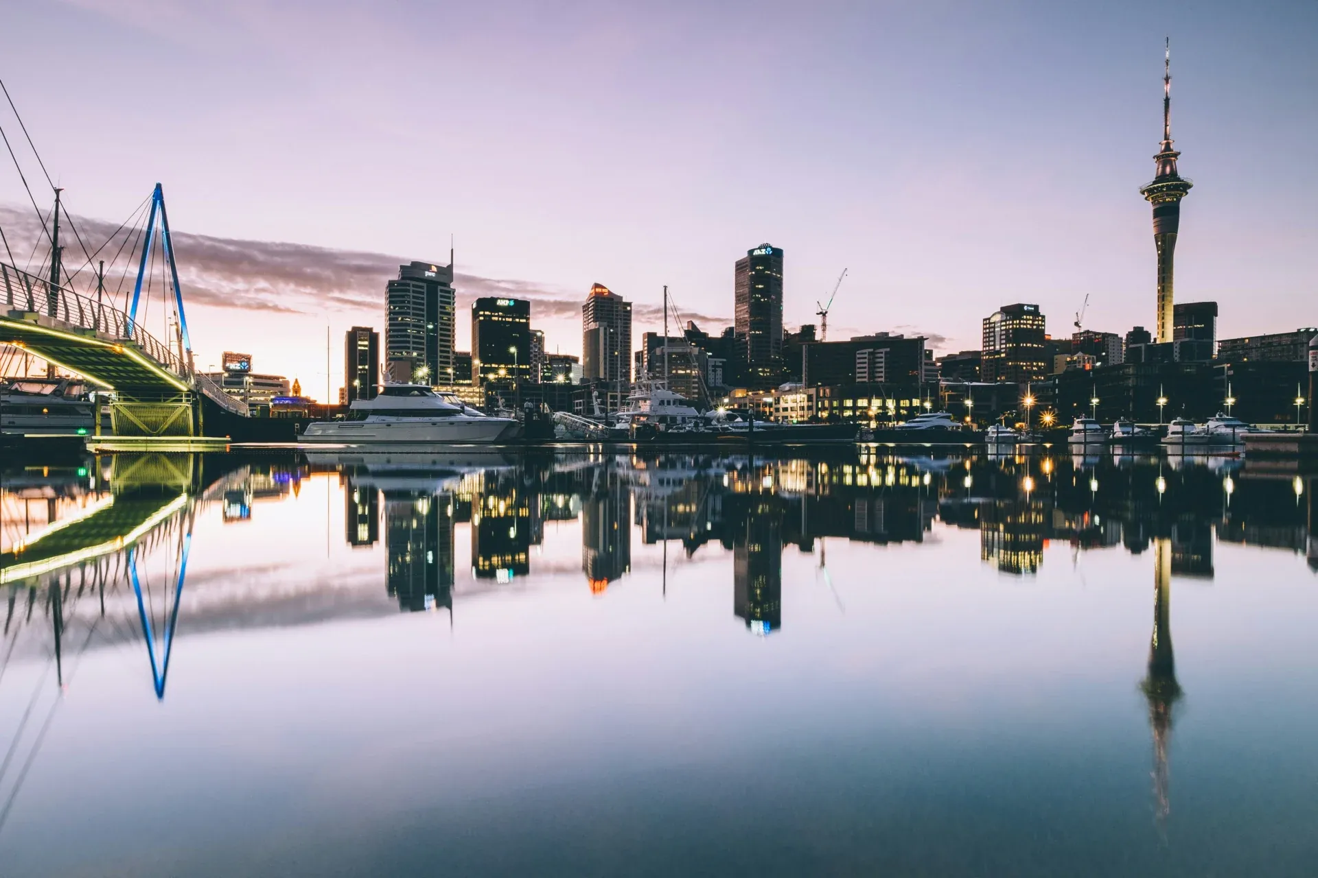 Auckland waterfront and Sky Tower at dusk
