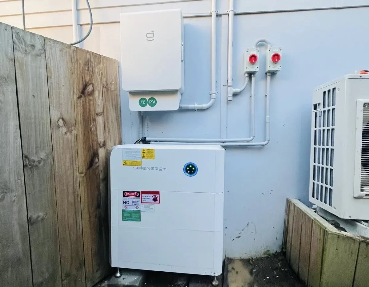 SigenStor battery installed on the side of a home