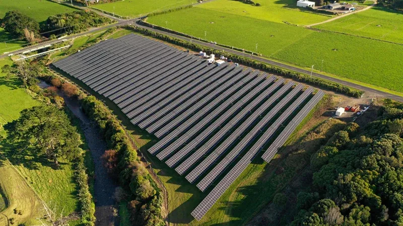 Aerial view of a utility-scale solar farm in New Zealand farmland
