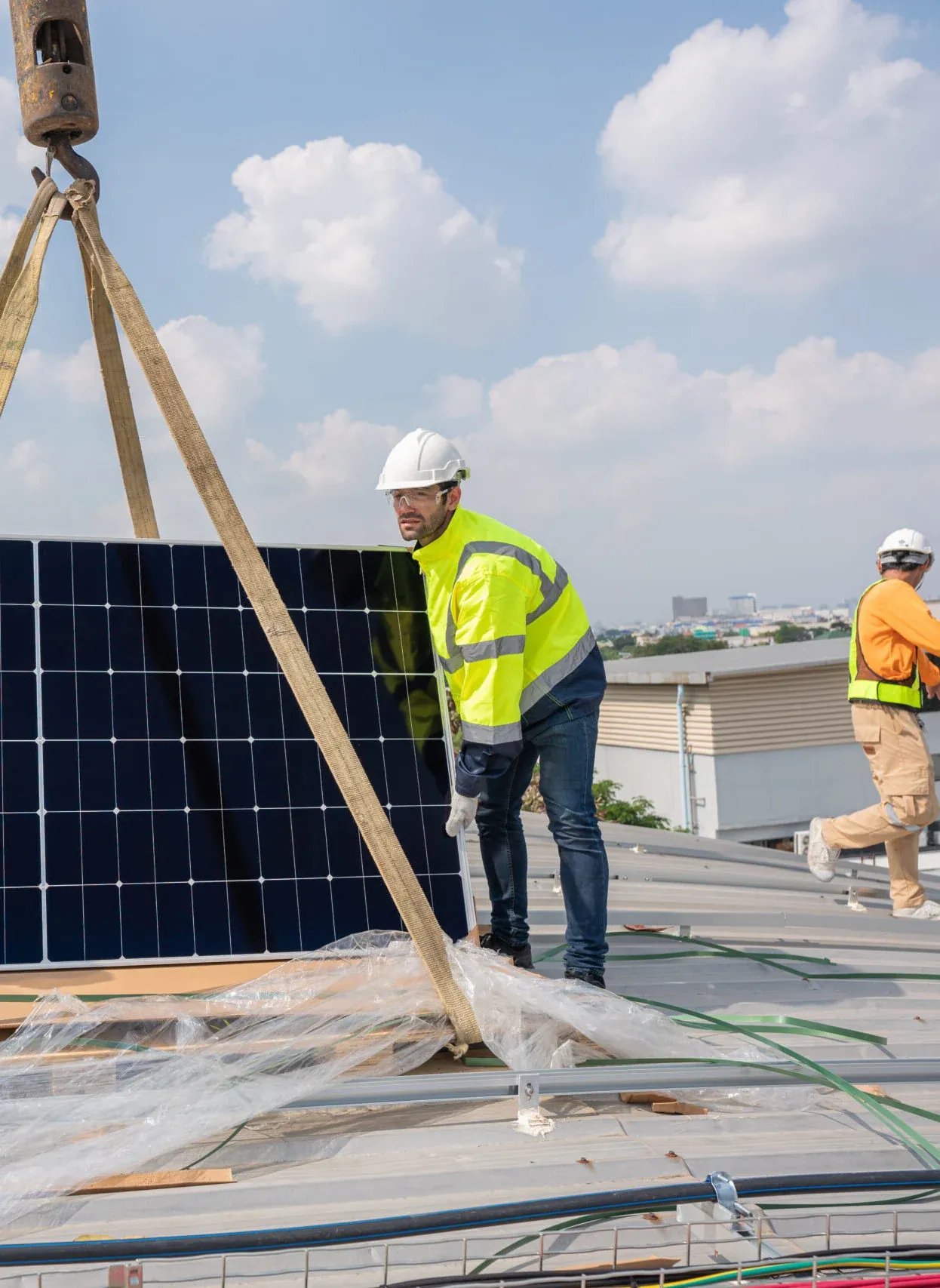 Installer placing a solar panel