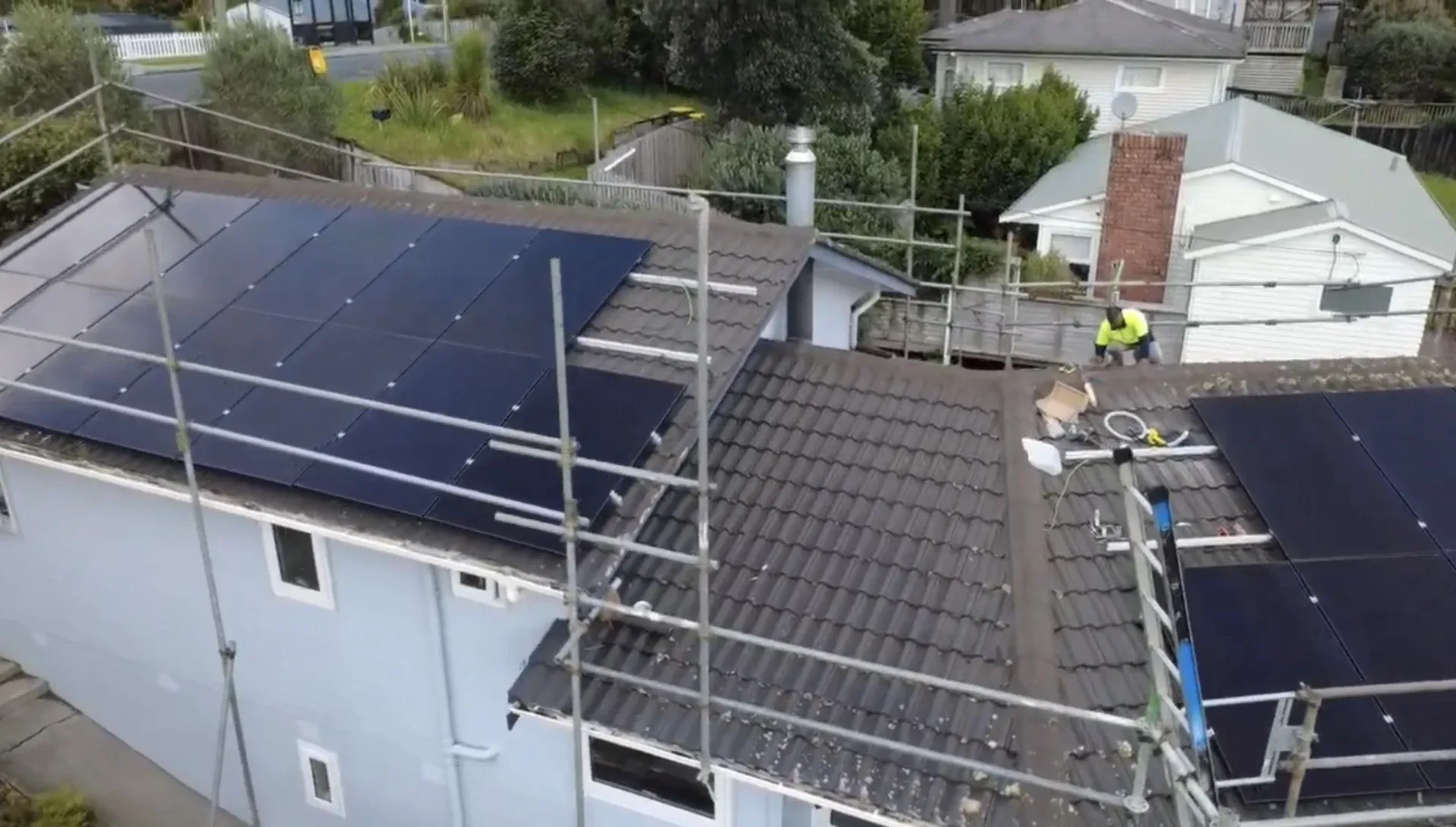 Scaffolding staged around a multi-level Auckland home